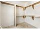 Unfinished pantry features custom shelving for ample storage solutions at 117 Owens Mill Pl, Canton, GA 30115