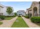Beautiful home with well-maintained lawns, charming gravel walkways, and picturesque curb appeal at 2004 Haley Walk, Woodstock, GA 30188