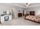 Spacious bedroom features a bed, dresser, vanity and carpet at 2004 Haley Walk, Woodstock, GA 30188
