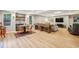Finished basement with a game area, dining area, and comfortable seating at 700 Winterwind Way, Roswell, GA 30075