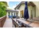 Spacious back deck with outdoor seating and dining area at 2355 Twelvestones Dr, Roswell, GA 30076