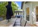 Back deck features outdoor seating and dining area overlooking lush greenery at 2355 Twelvestones Dr, Roswell, GA 30076