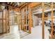 Unfinished basement showcasing exposed beams, insulation, and potential for customization and added living space at 2355 Twelvestones Dr, Roswell, GA 30076