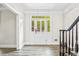 Foyer featuring elegant white trim and a decorative front door at 2355 Twelvestones Dr, Roswell, GA 30076