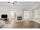Expansive main bedroom featuring a fireplace and entrances to the bathroom and a walk-in closet at 2355 Twelvestones Dr, Roswell, GA 30076