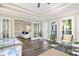 Sunroom featuring many windows and a doorway to another living space at 2355 Twelvestones Dr, Roswell, GA 30076