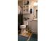 Functional bathroom with white fixtures, vanity, and a decorative shower curtain at 6193 Charring Cross Ct, Lithonia, GA 30058