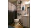 Functional bathroom with white fixtures, vanity, and a decorative shower curtain at 6193 Charring Cross Ct, Lithonia, GA 30058