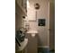 Small bathroom featuring white fixtures and vanity with a medicine cabinet at 6193 Charring Cross Ct, Lithonia, GA 30058
