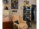 Themed bedroom featuring collectables, comfortable seating, and unique decor at 6193 Charring Cross Ct, Lithonia, GA 30058