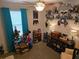 Fun bedroom with Batman decor, displays and a ceiling fan with overhead lighting at 6193 Charring Cross Ct, Lithonia, GA 30058