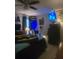 Whimsical bedroom featuring a fan, blue lighting, and batman decorations at 6193 Charring Cross Ct, Lithonia, GA 30058