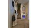 Inviting entryway with decorative elements, leading to an open staircase at 6193 Charring Cross Ct, Lithonia, GA 30058