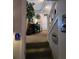 Inviting entryway with stairs leading to a bright living space, enhanced by unique decor at 6193 Charring Cross Ct, Lithonia, GA 30058