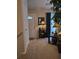 Welcoming living area featuring a front door, coat closet, and neutral-toned walls and carpet at 6193 Charring Cross Ct, Lithonia, GA 30058