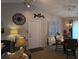 Bright living space with vaulted ceilings, modern decor, and an inviting dining area at 6193 Charring Cross Ct, Lithonia, GA 30058