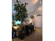 Bright living room showcasing a large houseplant, art and the word 'Gather' on the wall at 6193 Charring Cross Ct, Lithonia, GA 30058