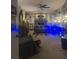 Spacious living room features a Batman themed decor, plush seating, and soft carpeting at 6193 Charring Cross Ct, Lithonia, GA 30058
