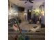 Living room decorated with collectables and unique decor at 6193 Charring Cross Ct, Lithonia, GA 30058