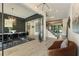 Elegant dining room and foyer with hardwood floors, decorative lighting, and ample space at 214 Kenneth Drive, Alpharetta, GA 30009