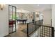 Recreation room featuring a pool table, pinball machine, accent wall, and hardwood floors at 214 Kenneth Drive, Alpharetta, GA 30009
