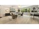 A luxurious main bedroom with sitting area and large windows for natural light at 214 Kenneth Drive, Alpharetta, GA 30009