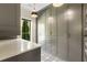 Gray mud room featuring built-in storage cabinets, drawers, pendant lights, and a marble countertop at 214 Kenneth Drive, Alpharetta, GA 30009