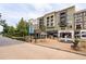 Charming European-style plaza featuring outdoor seating, fountain, and attractive storefronts at 214 Kenneth Drive, Alpharetta, GA 30009