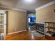 Spacious bedroom with wood floors, fireplace, and a doorway view to a Primary suite with trey ceilings at 2253 Carrington Dr, Ellenwood, GA 30294