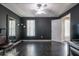 Bedroom featuring unique design, large window, and access to an adjacent room, ideal for relaxation and personal space at 2253 Carrington Dr, Ellenwood, GA 30294