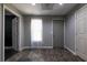 Bright entryway featuring durable flooring, a sheer curtained window, and convenient access to multiple rooms at 2253 Carrington Dr, Ellenwood, GA 30294