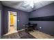 Simple office space featuring a sleek black desk, chair, and chalkboard accent wall, perfect for focused work at 2253 Carrington Dr, Ellenwood, GA 30294