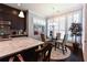 Bright kitchen and breakfast nook featuring granite counters and stainless steel appliances at 2262 Haventree Ct, Lawrenceville, GA 30043