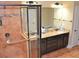 This bathroom features a glass shower and double sink vanity at 1032 Willow Field Se Ln # 17, Marietta, GA 30067