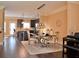 Open-concept dining area featuring modern light fixtures connecting to the kitchen at 1032 Willow Field Se Ln # 17, Marietta, GA 30067