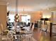 Open-concept design dining room with elegant decor and modern lighting at 1032 Willow Field Se Ln # 17, Marietta, GA 30067