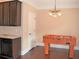 Bright game room area features a foosball table and dark brown cabinetry at 1032 Willow Field Se Ln # 17, Marietta, GA 30067