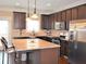 Modern kitchen with stainless steel appliances, granite countertops, and a kitchen island at 1032 Willow Field Se Ln # 17, Marietta, GA 30067