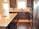 Stylish kitchen featuring granite countertops and stainless steel appliances with hardwood floors at 1032 Willow Field Se Ln # 17, Marietta, GA 30067