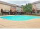 Community swimming pool with nearby townhomes, offering a refreshing amenity for residents at 1032 Willow Field Se Ln # 17, Marietta, GA 30067