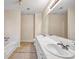 Bathroom featuring double vanity, tub, tile floors, and ample counter space at 1600 Dillwood Ct, Lithonia, GA 30058