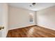 Neutral bedroom featuring vinyl floors and a single window at 1600 Dillwood Ct, Lithonia, GA 30058