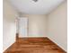 Neutral bedroom featuring vinyl floors and 2 doors at 1600 Dillwood Ct, Lithonia, GA 30058