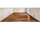 Bright bedroom featuring laminate wood flooring, neutral walls, and natural light at 1600 Dillwood Ct, Lithonia, GA 30058