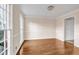 Spacious living room with hardwood floors, natural light, and neutral-colored walls at 1600 Dillwood Ct, Lithonia, GA 30058