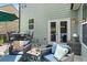 Outdoor deck with wicker seating and a round table, perfect for enjoying the outdoors at 2660 Brentwood Estates Ct, Cumming, GA 30041