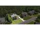 Aerial view of a residential neighborhood with mature trees, well-maintained lawns, and beautiful homes at , Cumming, GA 30041