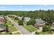 Aerial view of a residential neighborhood featuring lush greenery, well-manicured lawns, and beautiful homes at , Cumming, GA 30041