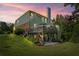 Backyard with deck, patio, and lush landscaping at , Cumming, GA 30041