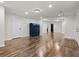 Large basement featuring laminate wood flooring, lots of open space, and white trim at , Cumming, GA 30041